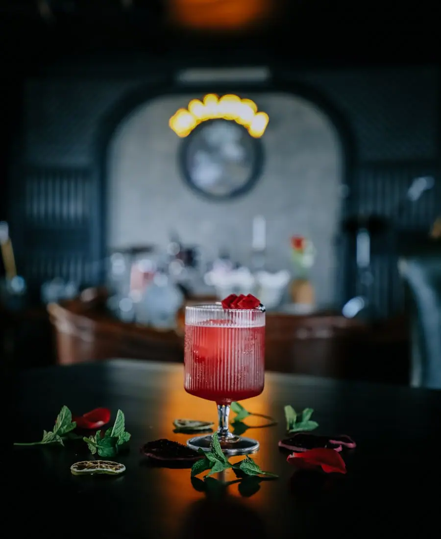 Deep red Negroni served on the rocks in a heavy tumbler with a twist of orange peel, glowing under warm light
